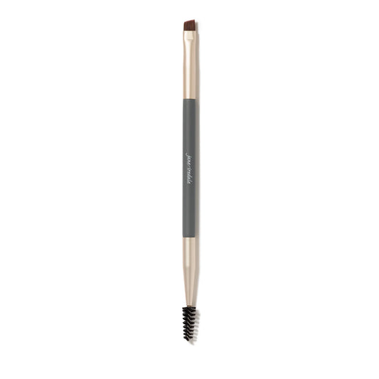 Ultra-small, dual-ended eye brush and spoolie designed to groom brows and apply liquids, creams and powders.