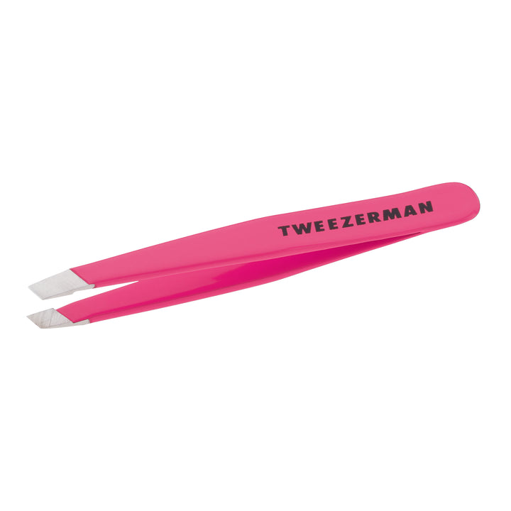 Grab every hair, every time with Tweezerman's Mini Slant Tweezer. This mini version of the award-winning Slant Tweezer features perfectly aligned, hand-filed tips to shape your brows with precision and ease, perfect for on the go.